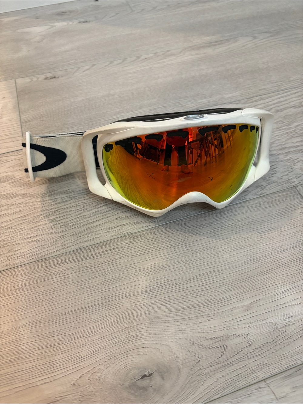 Oakley White Frame Ski Goggles with Orange-Red Mirrored Lens